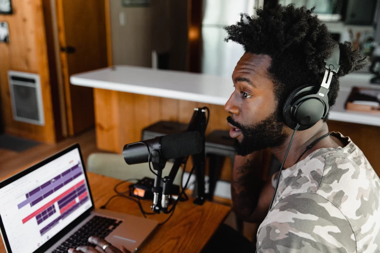 Man Using Microphone For Podcasting