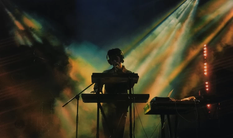 Performing Live Gig With Keyboard And Microphone